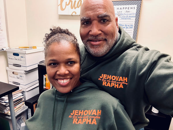 “JEHOVAH RAPHA: OUR HEALER” UNISEX HOODIE Olive Green w/ Orange