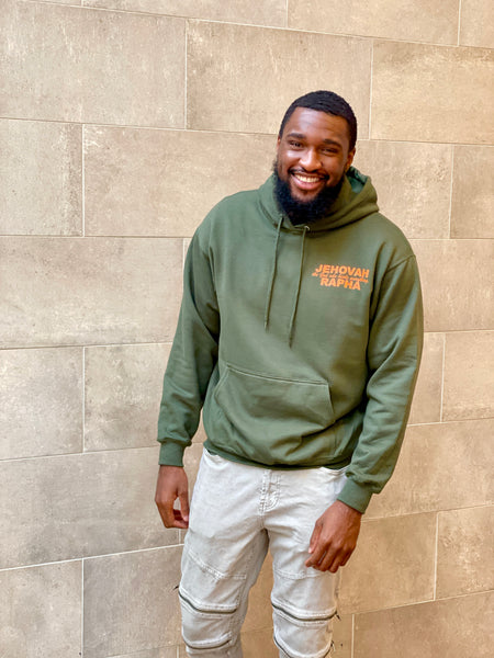 “JEHOVAH RAPHA: OUR HEALER” UNISEX HOODIE Olive Green w/ Orange
