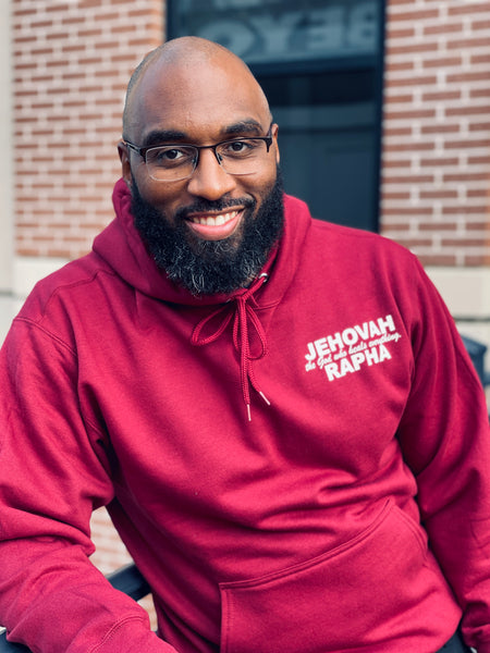 “JEHOVAH RAPHA: OUR HEALER” UNISEX HOODIE  Cardinal w/ Off white