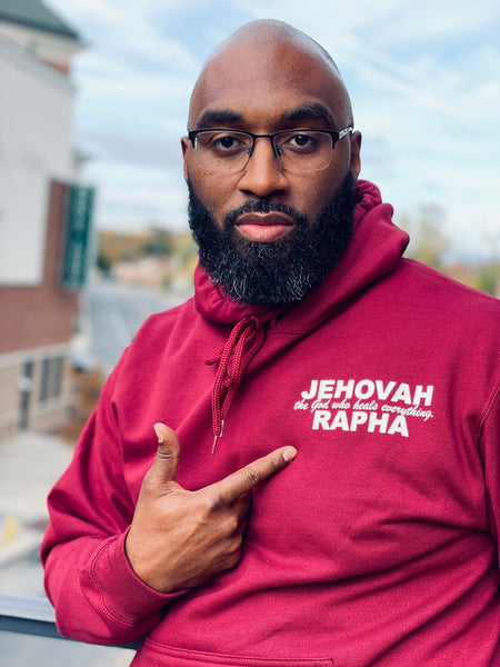 “JEHOVAH RAPHA: OUR HEALER” UNISEX HOODIE  Cardinal w/ Off white